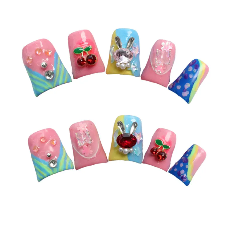 Pink and blue fairytale nail art: a lovely adventure embellished with gemstones